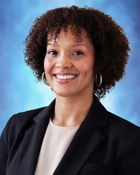 portrait of a smiling women with black hair