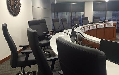 empty seats in the City Commission chambers